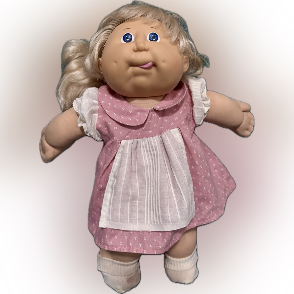 Vintage 1982 Coleco Cabbage Patch Girl, tongue out, blonde hair, blue eyes